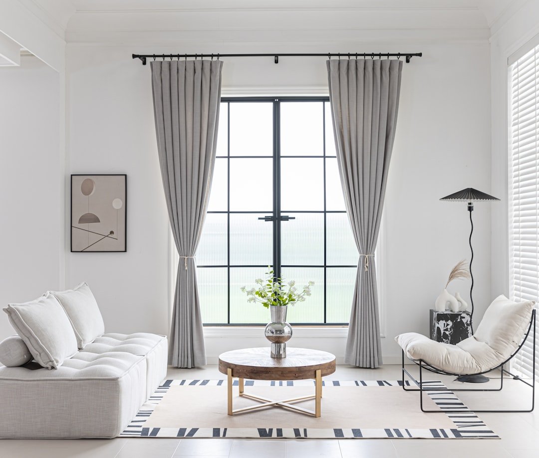 Motorized smart curtains and blinds in a bright modern living room