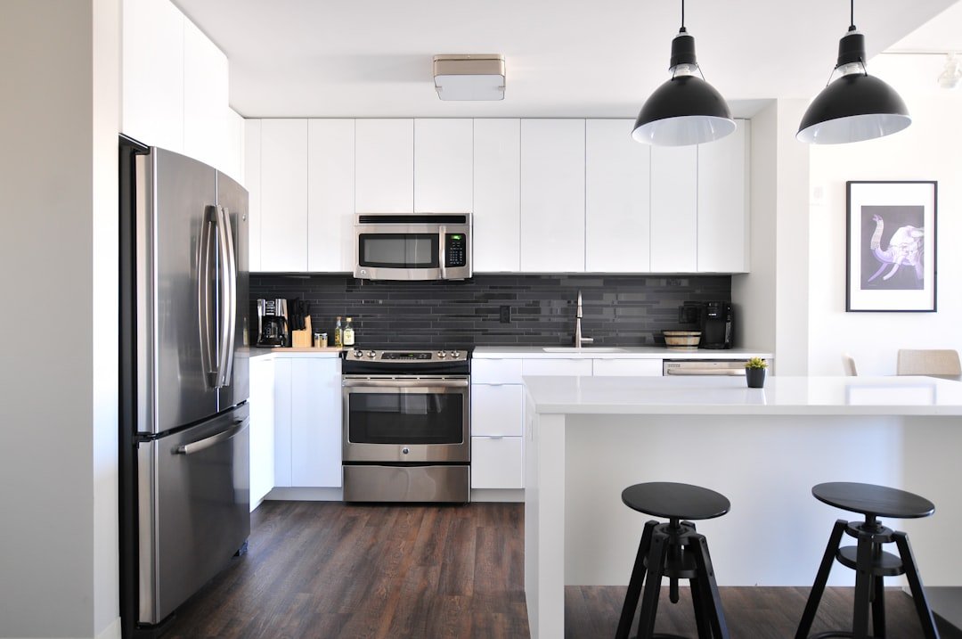 Modern smart kitchen with connected stainless-steel appliances